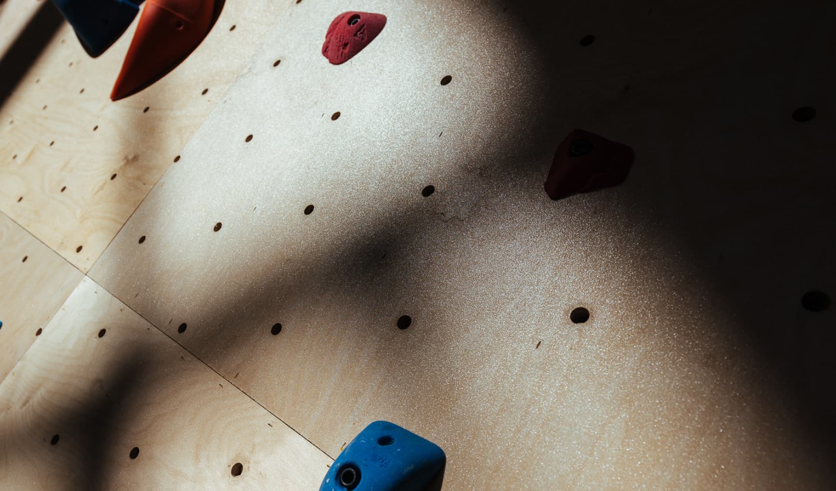 Sunny climbing wall surface texture