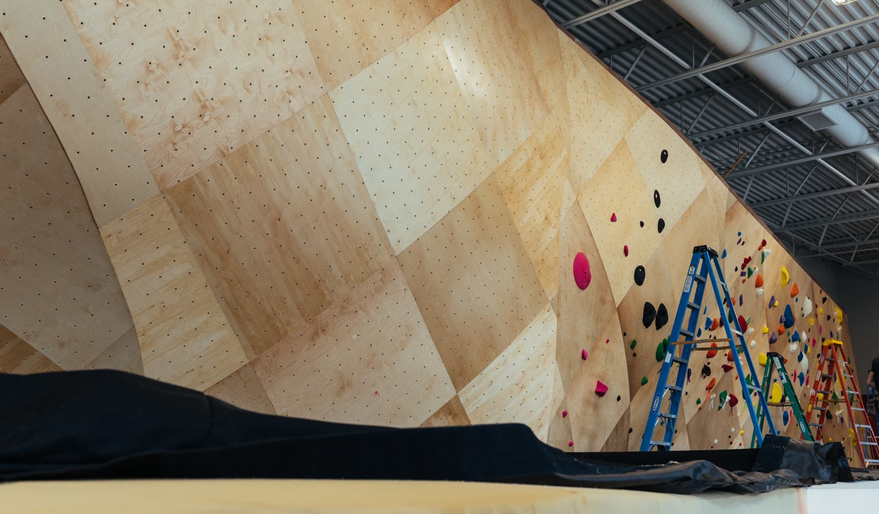 Indoor rock climbing wall under construction