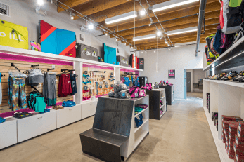 A climbing gear shop with custom shelving and seating