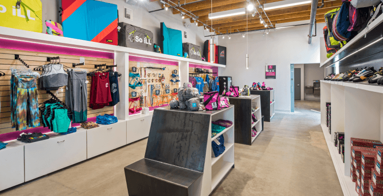 A clean and organized climbing gym retail area