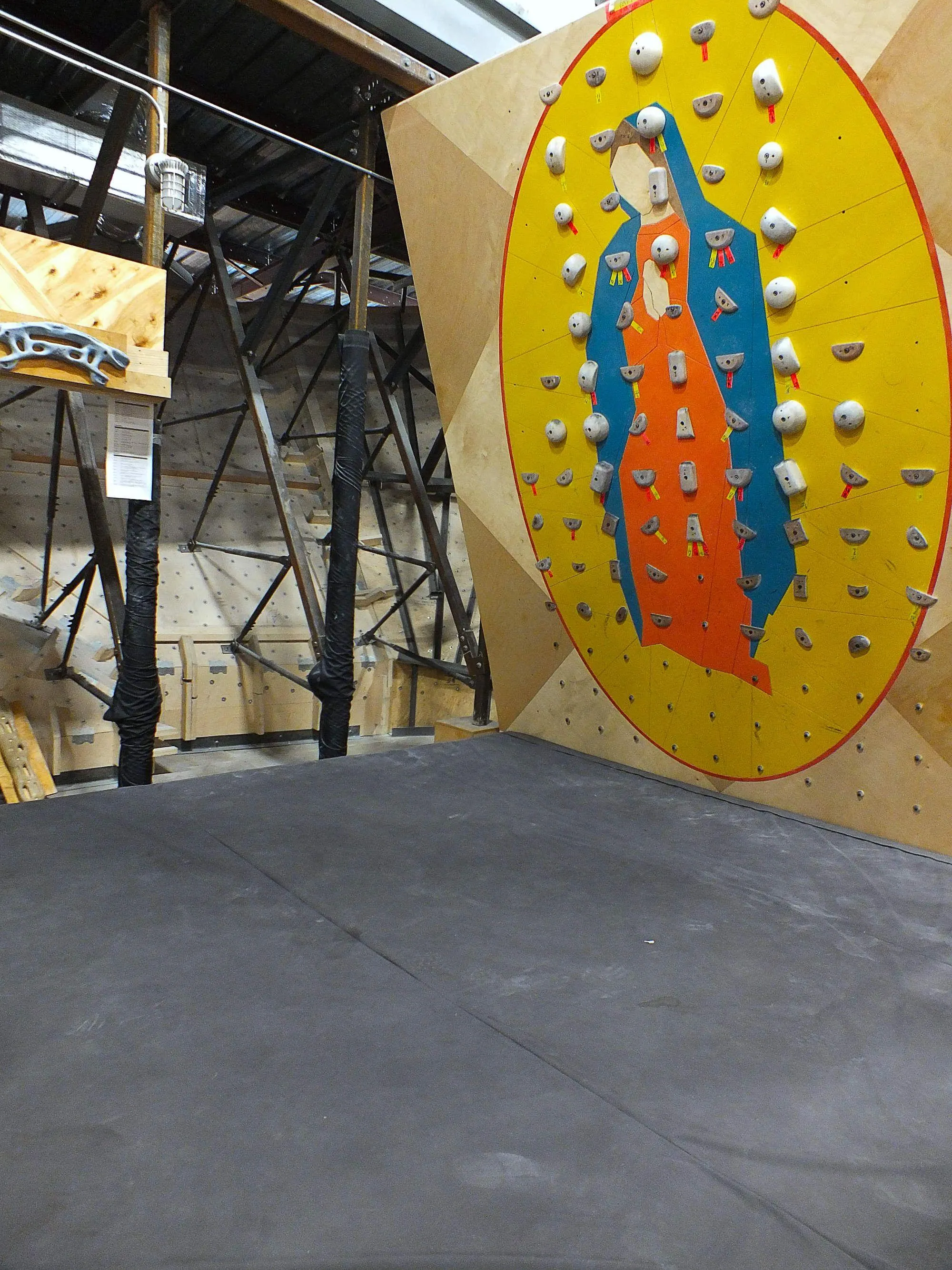 Painted and routed to mimic stain glass, this training wall depicts the Virgen de Guadalupe, a staple of San Antonio Latin culture.