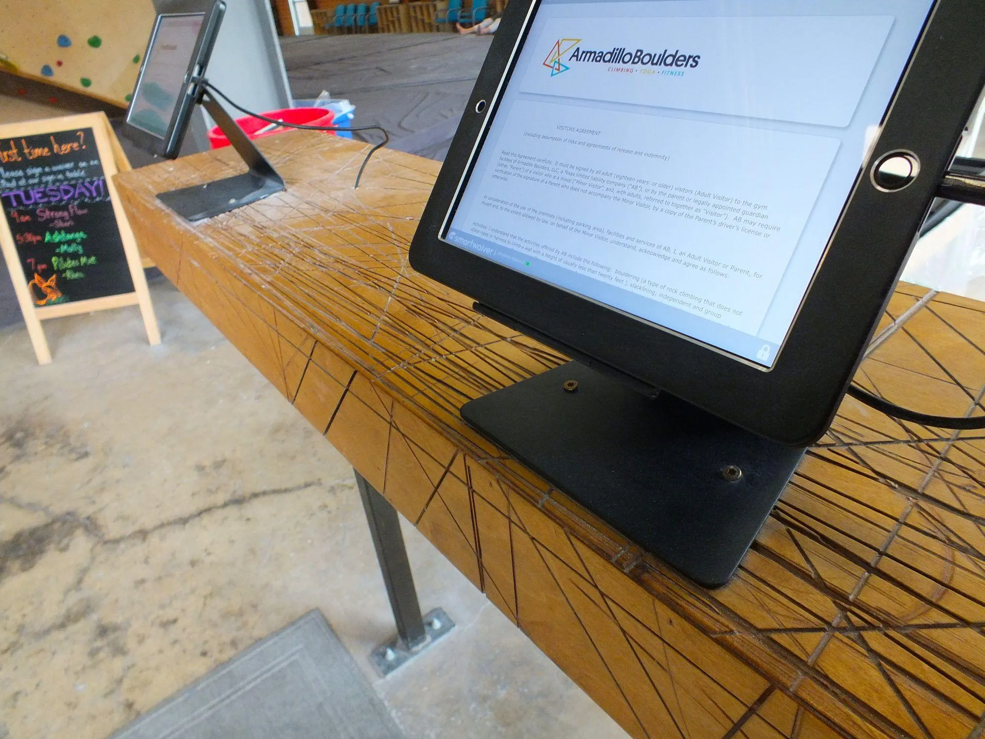 This check-in counter was built with the wood from a saw-horse used during the production of the individual wall panels.