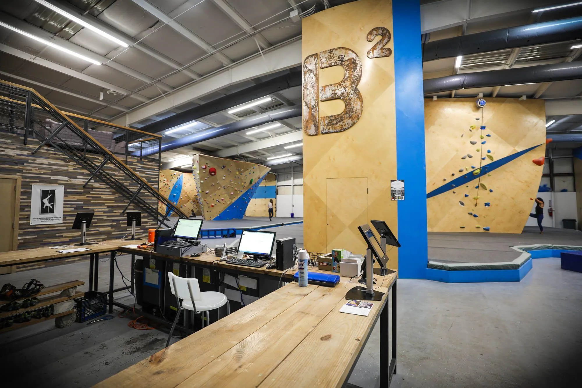 What you are greeted with upon entry; the front desk for check-in but more importantly a wide-angle view of much of the facility's offerings, including the lounge area up the stairs to the left.
