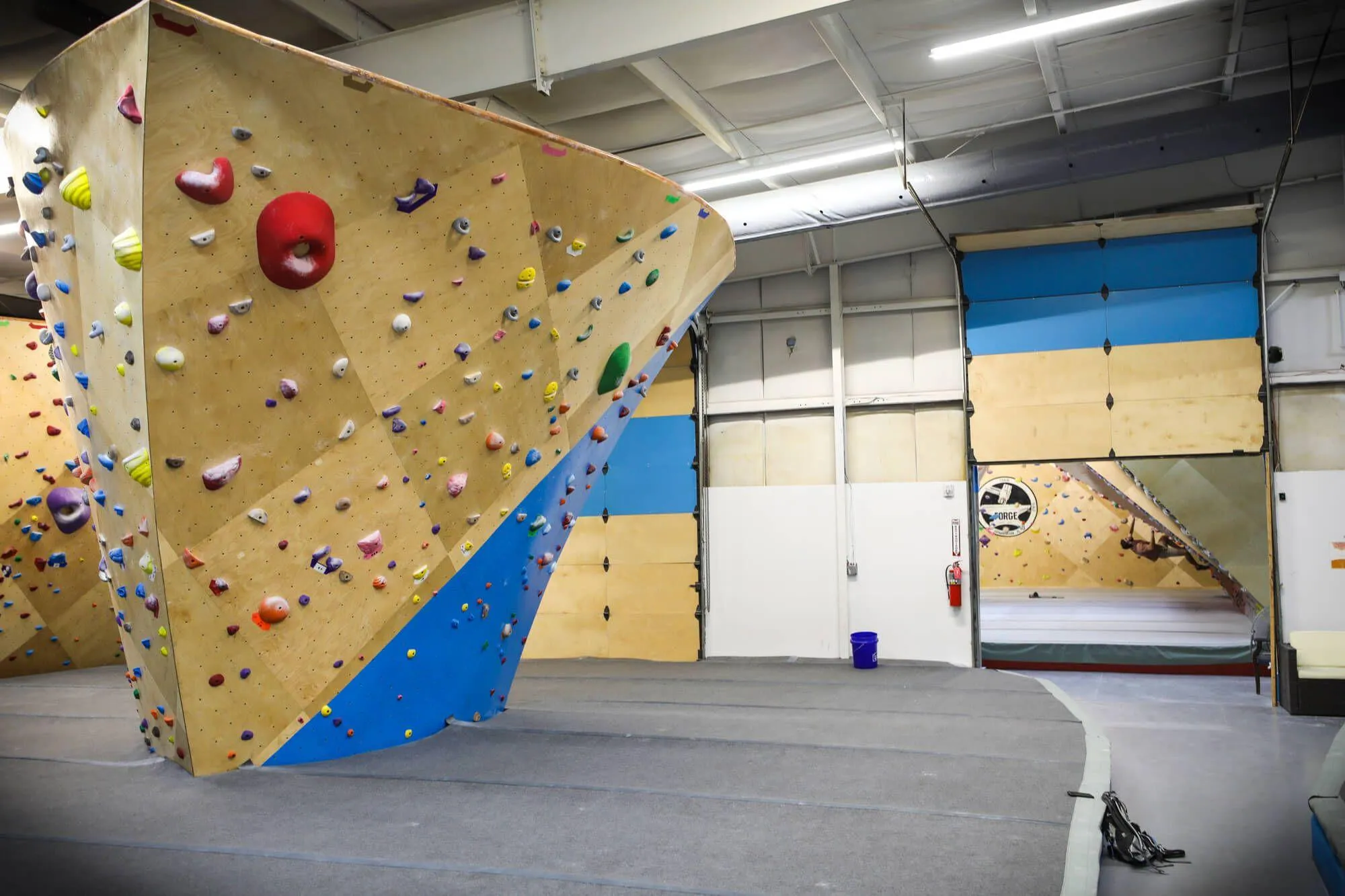 Getting worked on the climbing walls? Consider stepping next door to The Forge to up your game and train at a top-notch facility, seen here through the garage door.
