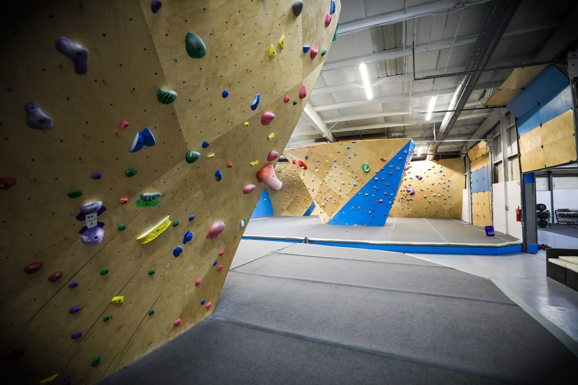 Lots of space for climbers to spread out in this facility, as you can see here from the S-Wall looking towards the Funnel Boulder and South Wall area.
