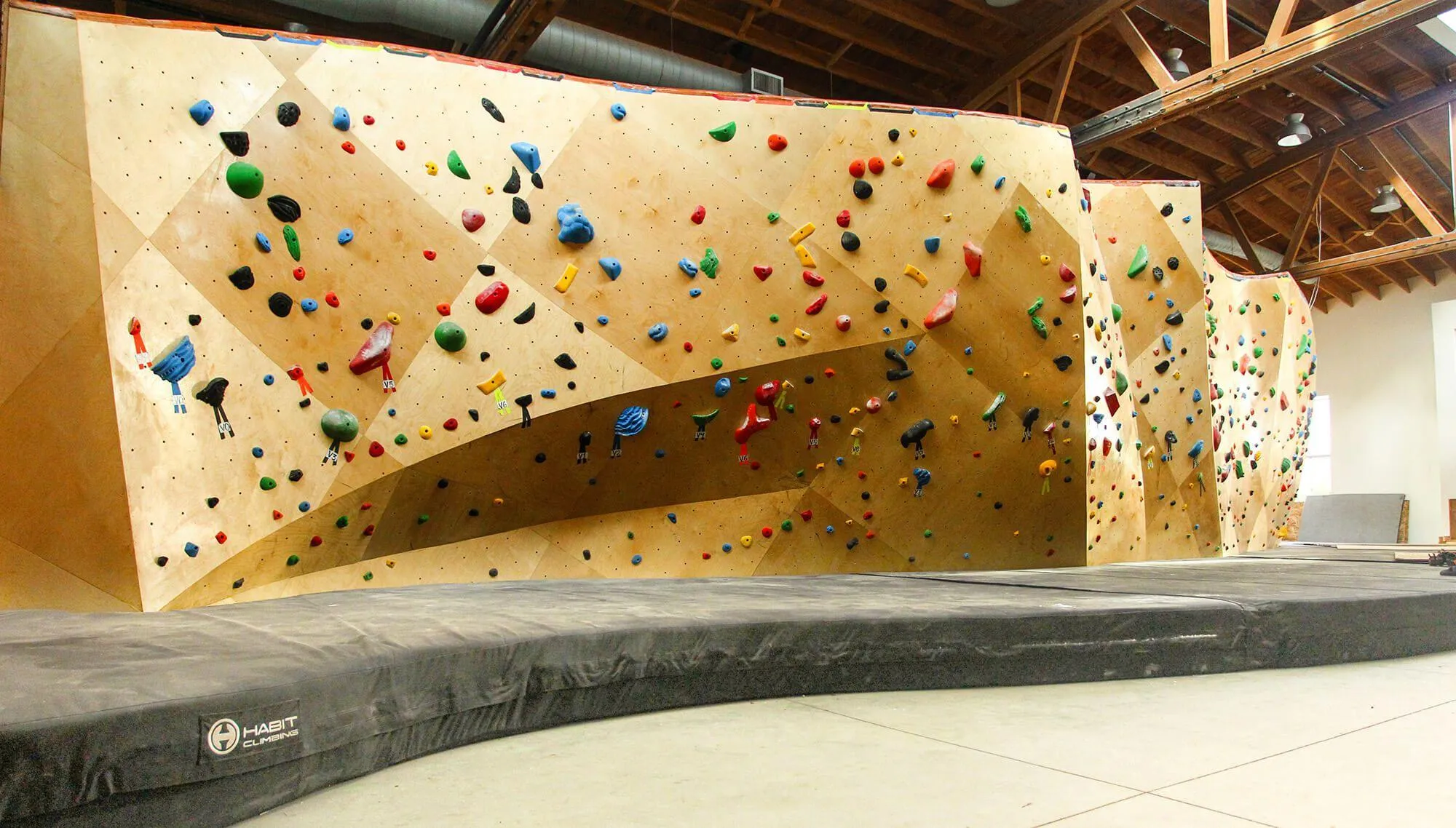 One of the bouldering areas has distinct ridges both vertical and horizontal to visually break up the space, but using ARC wall construction still remains super flowy and part of a bigger overall bouldering system. 
