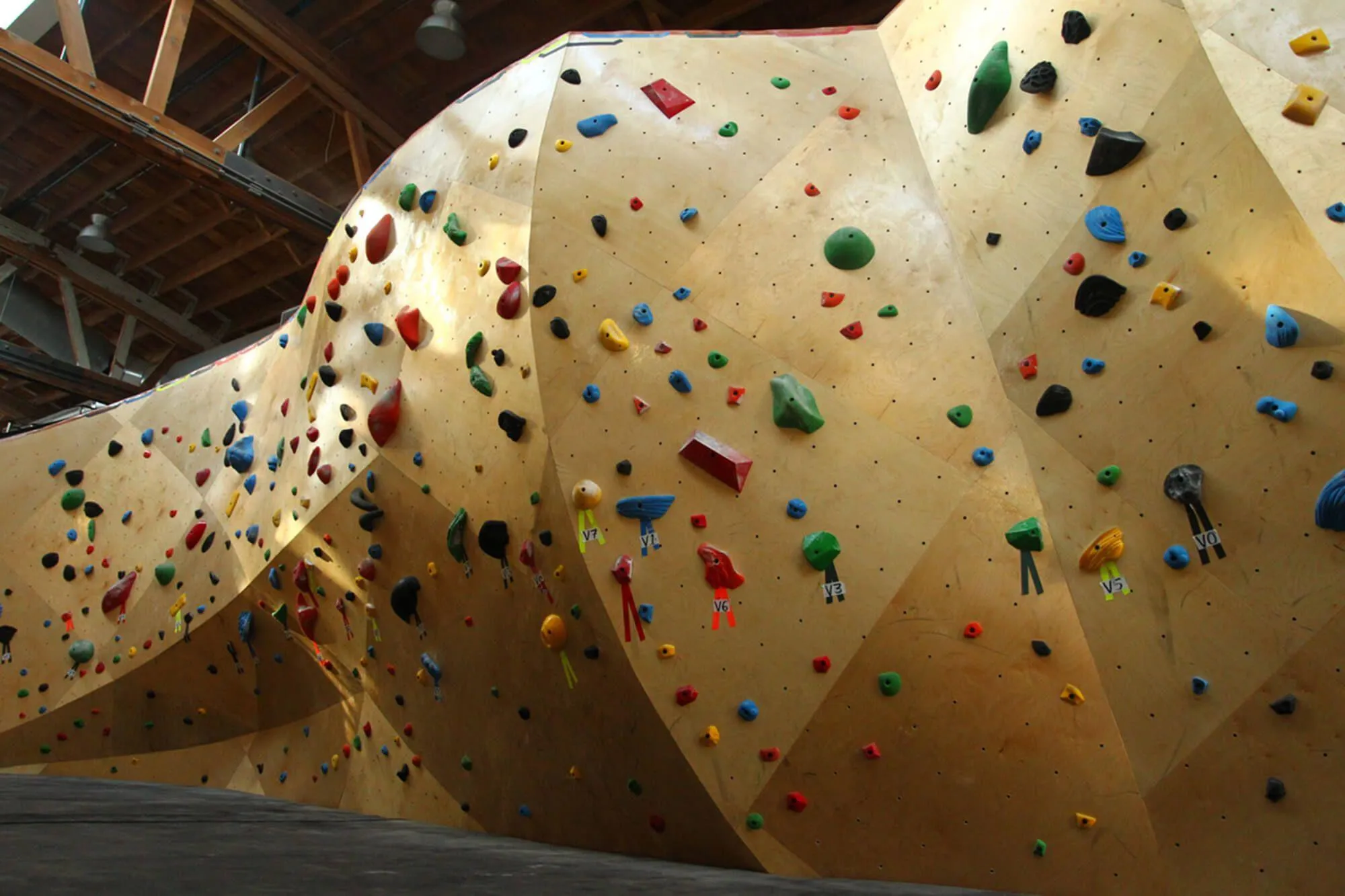 Another angle of the unique bouldering wall customers are first greeted with upon entry to BKB. These are ARC walls with a unique aesthetic and give visitors a glimpse of what to expect throughout the facility.
