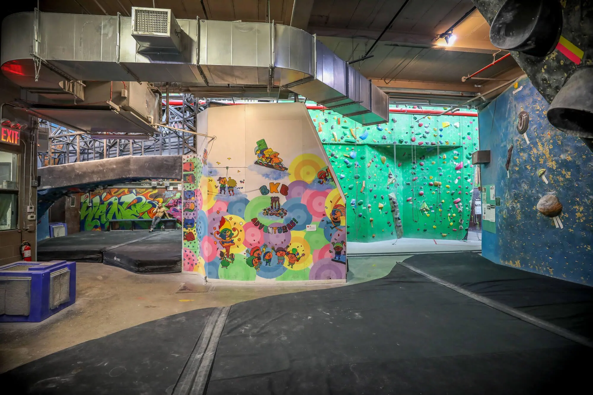 A View from the back of the facility where the original owner-built walls are still providing climbers with fresh routes.
