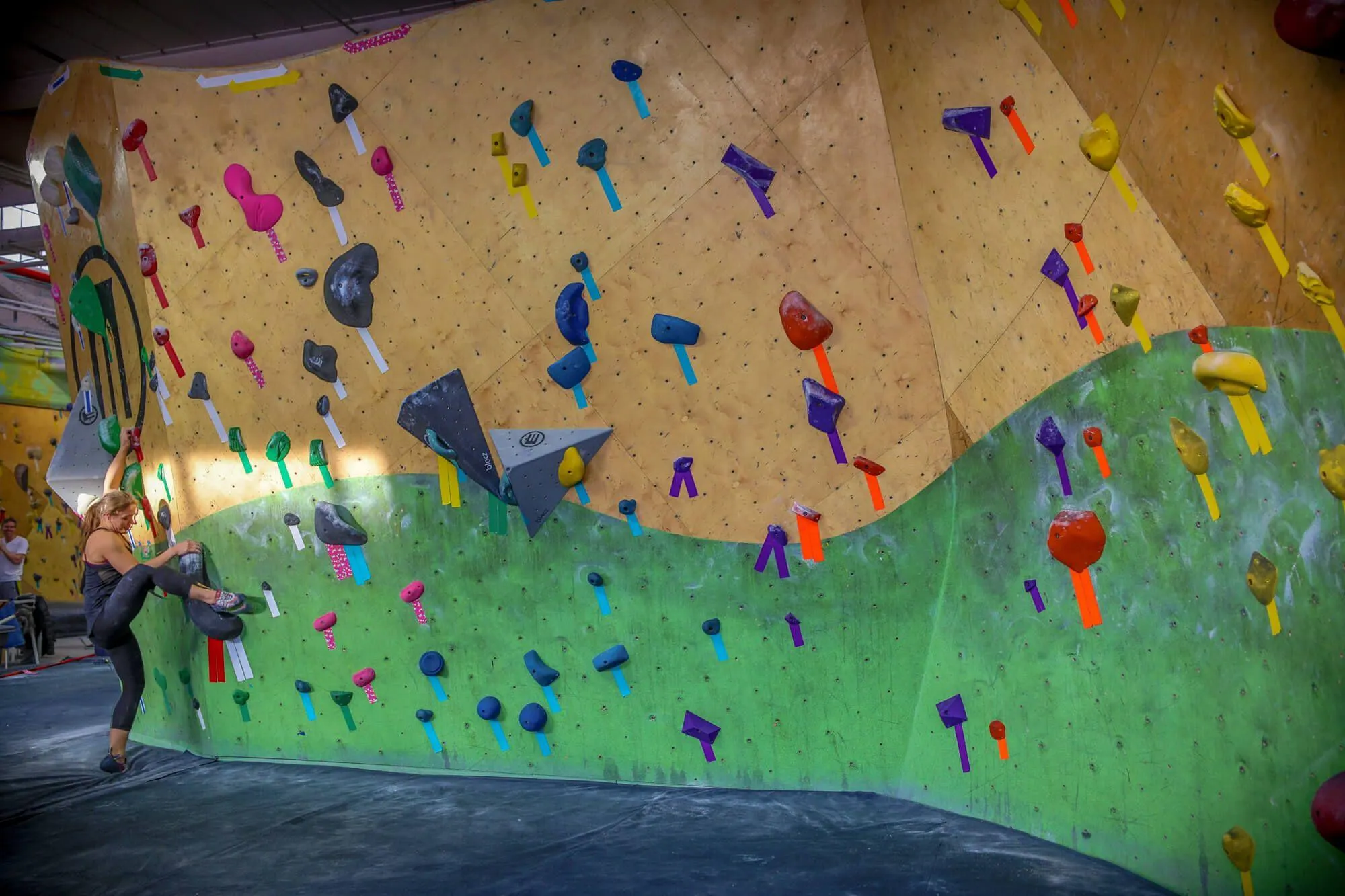 Bouldering is a large part of the facility with many of the climbing walls having been built by VS and using custom stains and paints. These walls stand the test of time and despite the angle in this picture, they offer flowy ARC curves or MLM geometric panels depending on which bouldering area you are in.
