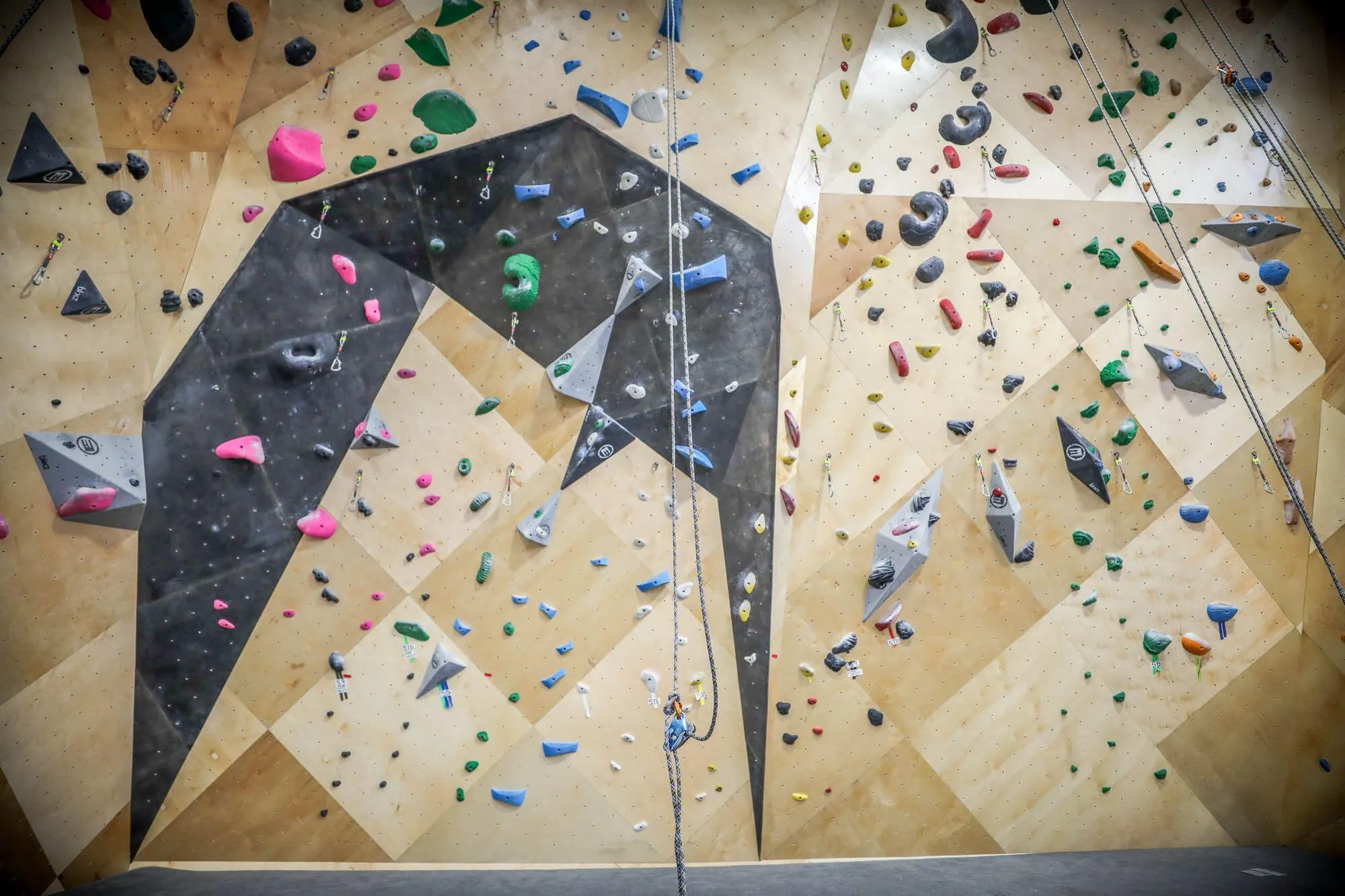 A head-on view of the newly-renovated route climbing walls that Vertical Solutions worked tirelessly against a tight deadline to complete; all without causing a gym-closure. 
