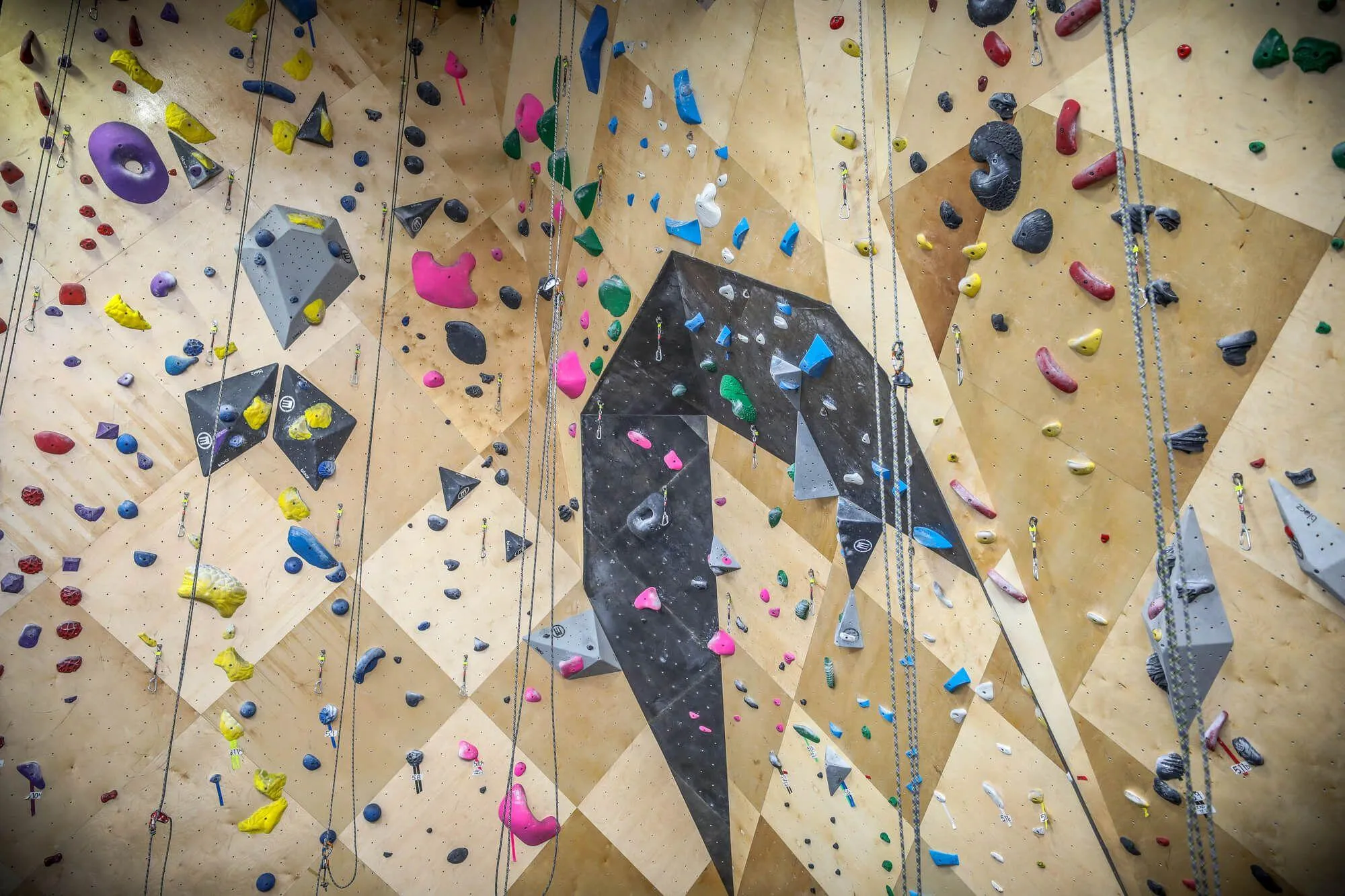 Another grand view of the finished product. Vertical Solutions unique wood walls can really make your indoor climbing gym stand out amongst a crowd, as seen here. These walls replaced more dated, owner-built walls that eventually ran their course. 
