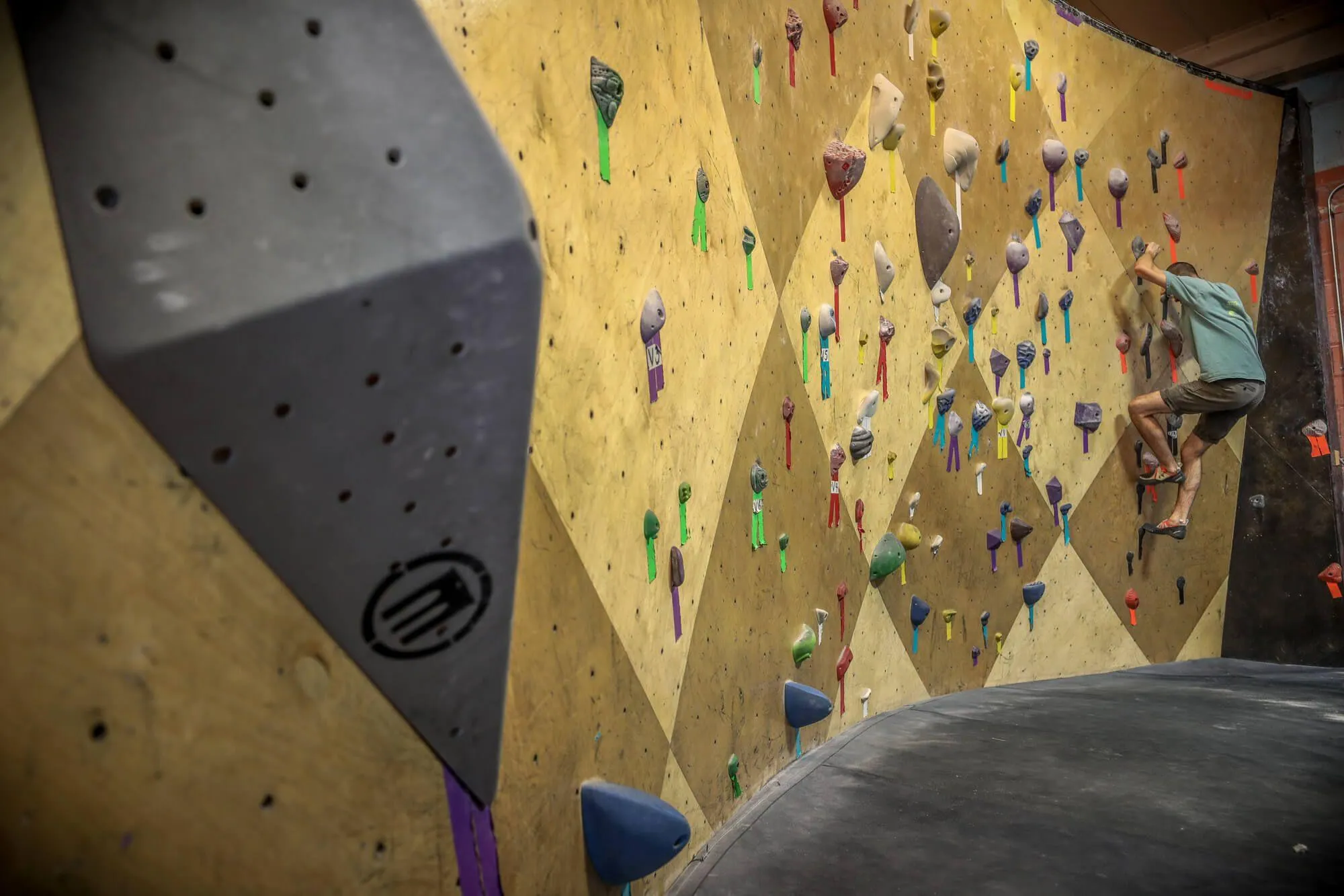 The facility has multiple rooms and every square inch is used to give their climbing community the most options for working themselves out physically, mentally, and emotionally.  This Vertical Solutions-built wall is one of many in the facility. 

