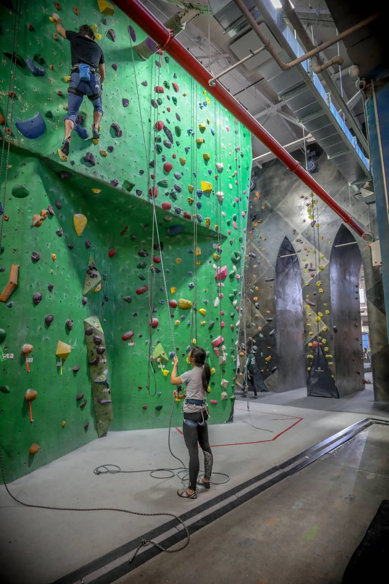 This view shows some of the original owner-built rope climbing walls, including the back side of the iconic Brooklyn Bridge climbing feature. 
