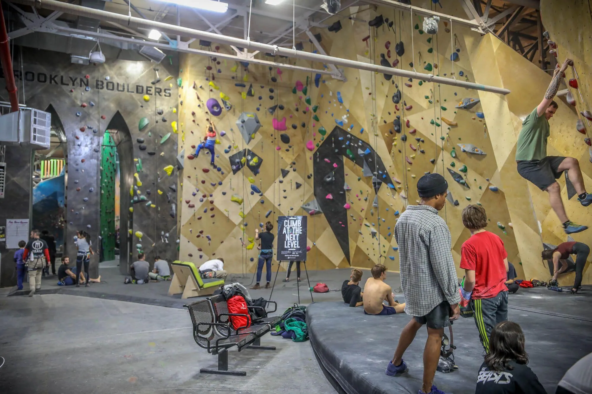 Just beyond the first bouldering peninsula and front desk/staff area, the facility opens up to reveal some impressively high lead and top-rope climbing walls, recently renovated by Vertical Solutions to match walls built at other BKB facilities. 
