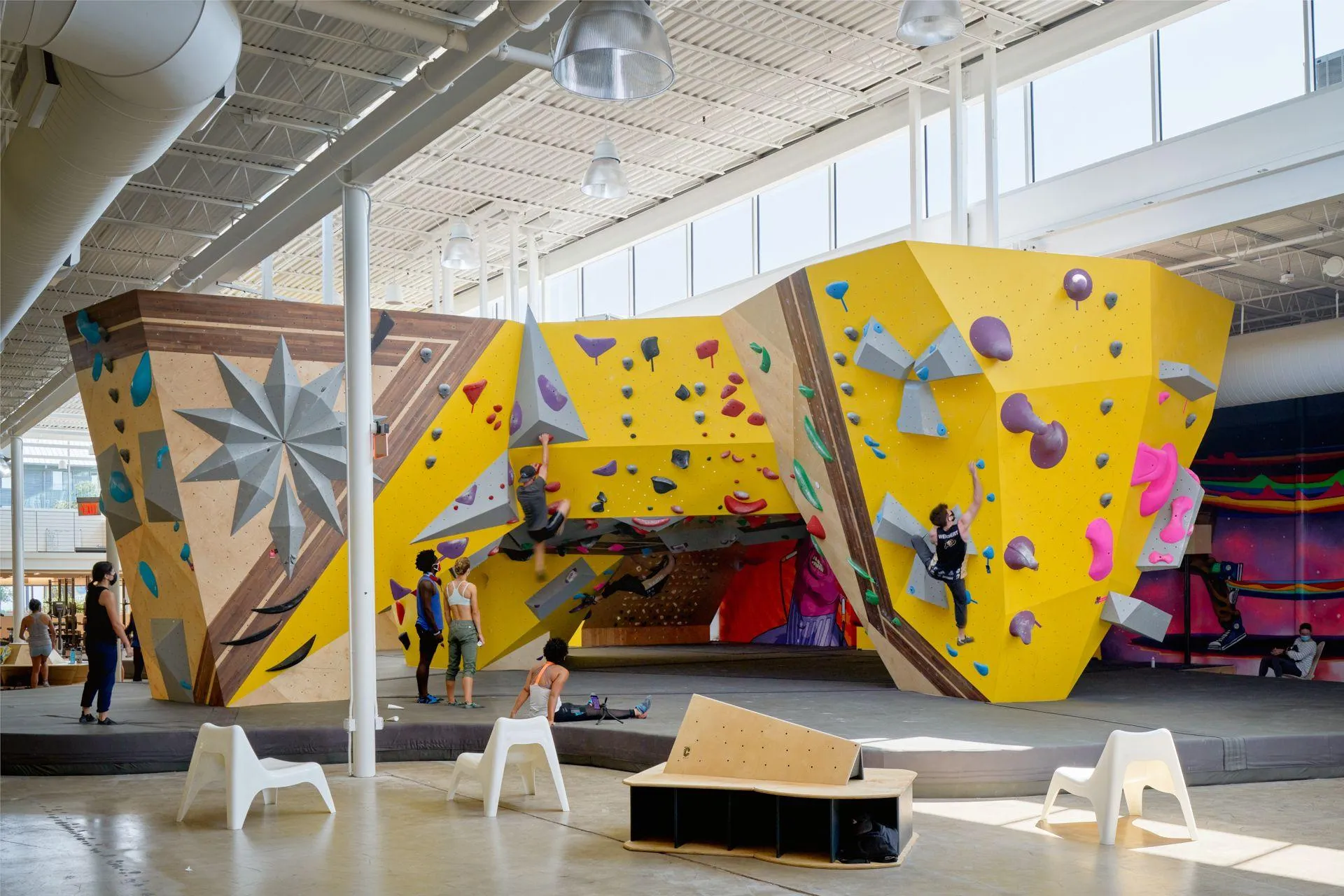 This second location makes massive caves a tradition at Crux, providing the community with ample space to climb on the ceilings. Falls are cushioned by a sleek custom Habit flooring system.
