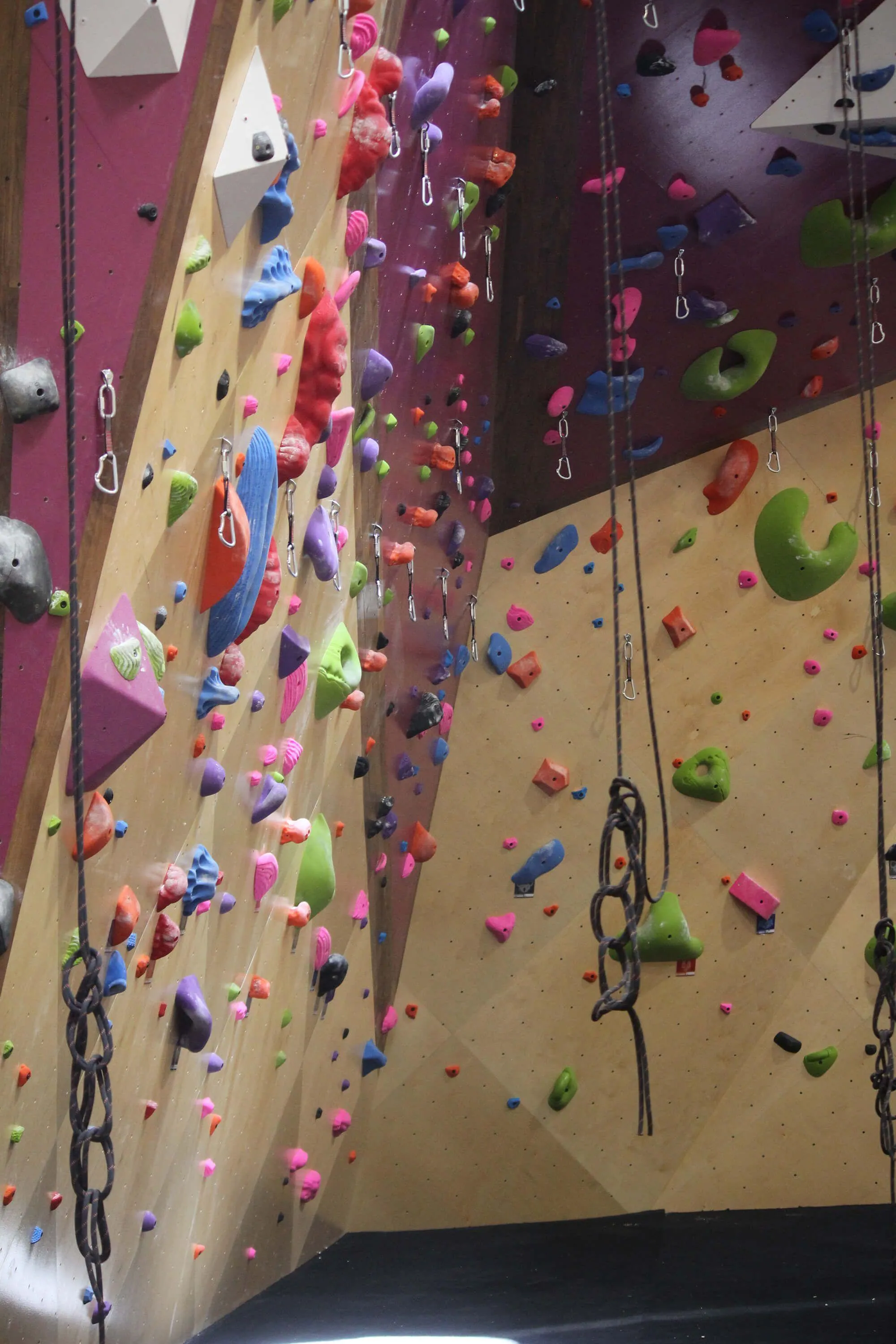 Crux features some impressive MLM constructed walls that match the branding that the owners incorporated throughout. This is a detail that is incredibly important to Vertical Solutions to execute on.
