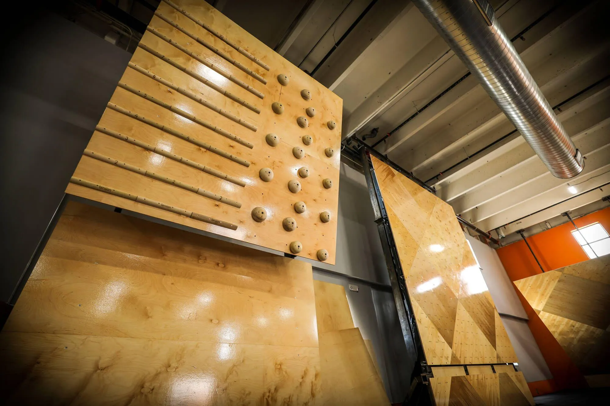 A usual suspect, the Tension Climbing campus board sits next to the brand new adjustable Kilter board, made possible by VS and ATP (Adjustable Training Platform) construction.