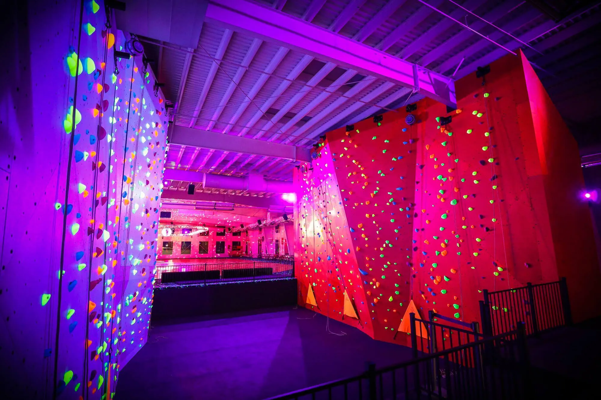 Imagine how stoked you would be to turn the corner after spending all your quarters in the arcade, to find this: a plethora of fun and challenging climbing walls all black-lit with climbing holds! This facility illustrates how deep our range of offerings truly goes.