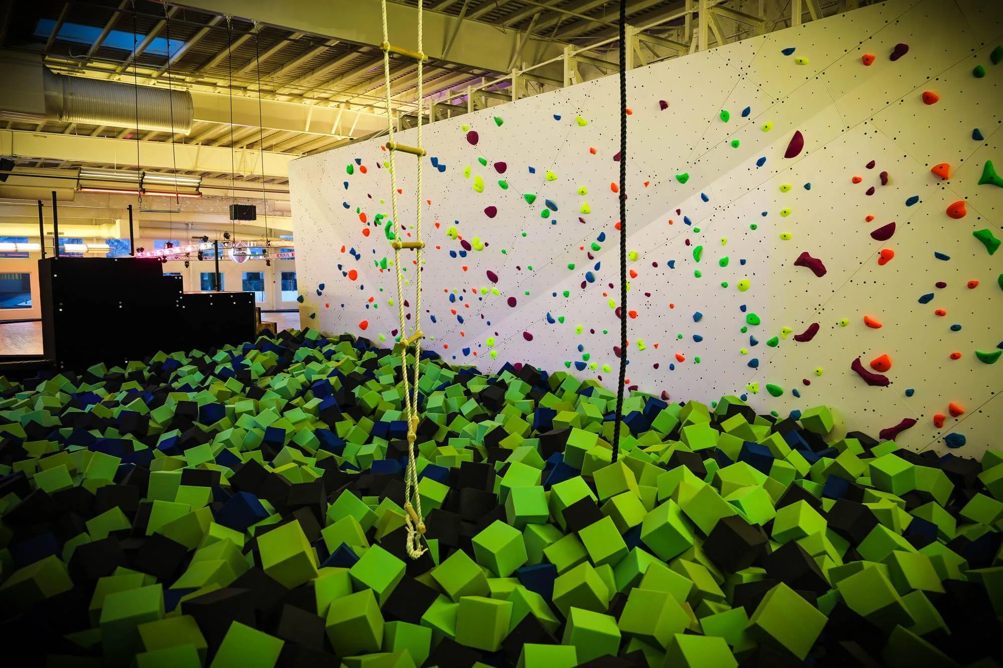 One of the crown-jewels of the facility is this awesome bouldering wall and foam pit for kids to jump into after climbing to the top! Kids really do have it easy here.We were psyched to be part of such a fun project.