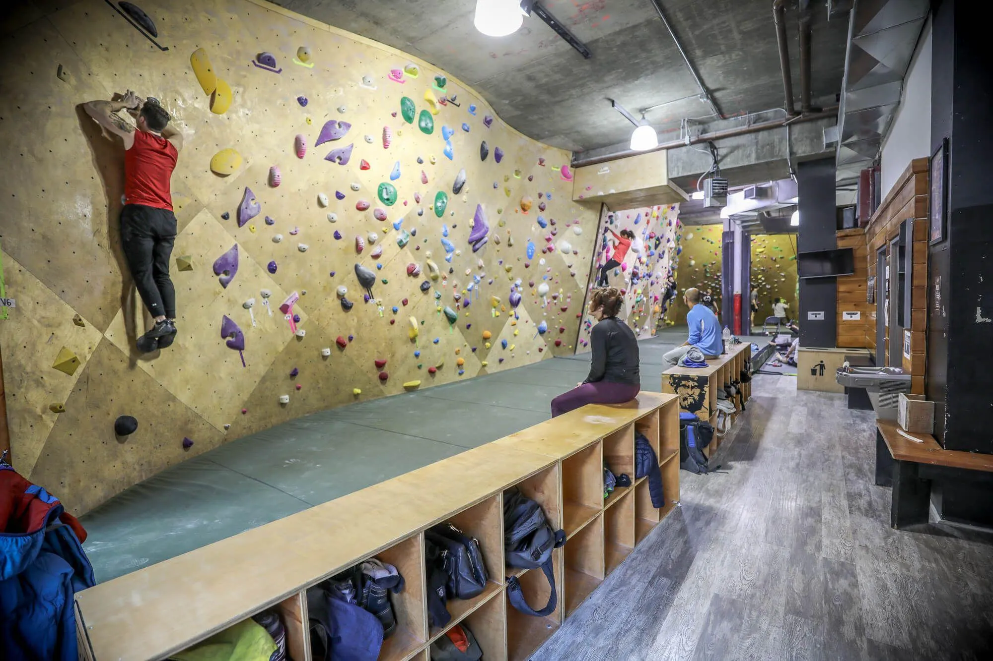 You can see how long and thin the layout is in this picture, which created an interesting challenge for climbing wall designers to create unique and challenging features without getting carried away with overhung angles.
