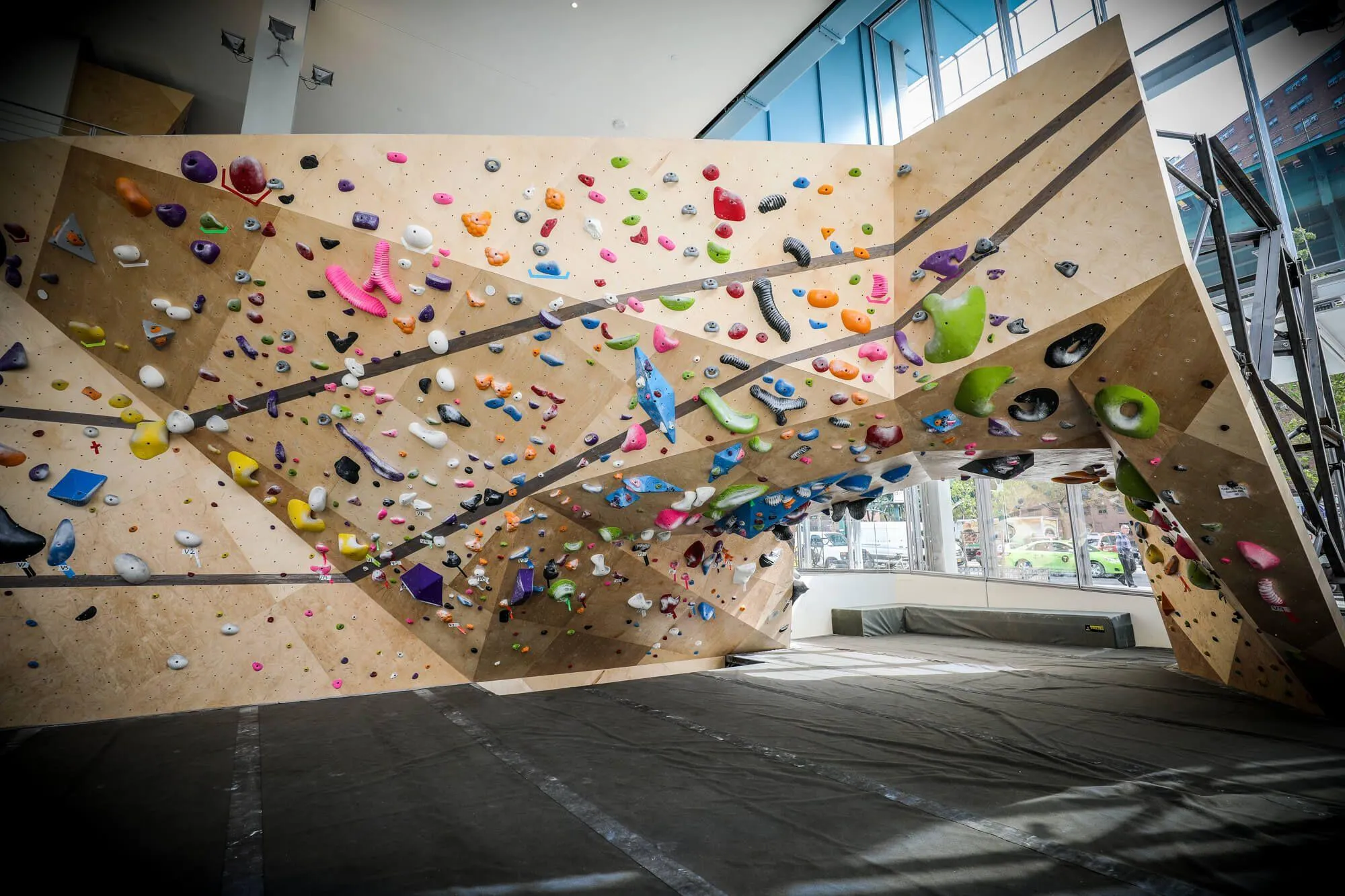 It would have been easy to come into this space and pursue the need to maximize the climbing square footage, but that wouldn't have been authentic to the Steep Rock Bouldering brand that Michael Cesari created. Instead, together with Vertical Solutions, he created a project that was stunning enough to be put on display in New York City and maintain his devotion to the climbing community simultaneously.
