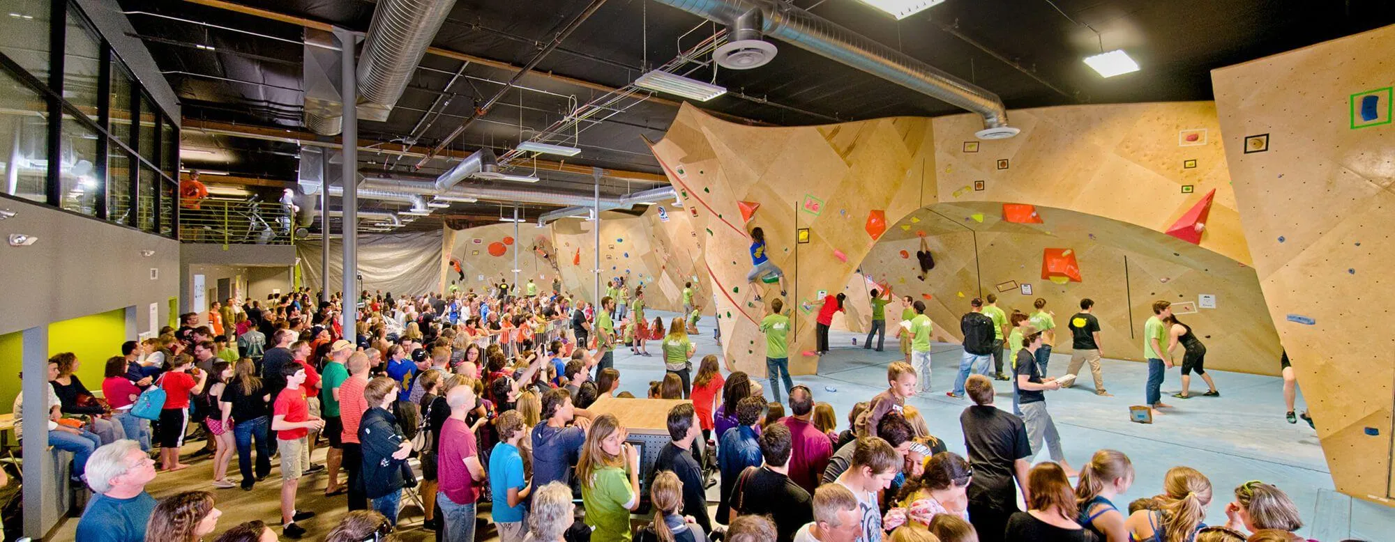 Another wide angle view of the climbing gym during a comp. But in this view, you can start to see where the fitness aspect of their business model come into play, with a large yoga studio and free weights/cardio area on the left hand side of the image, on the second floor.
